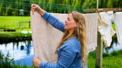 Carolyn hanging Laundry.