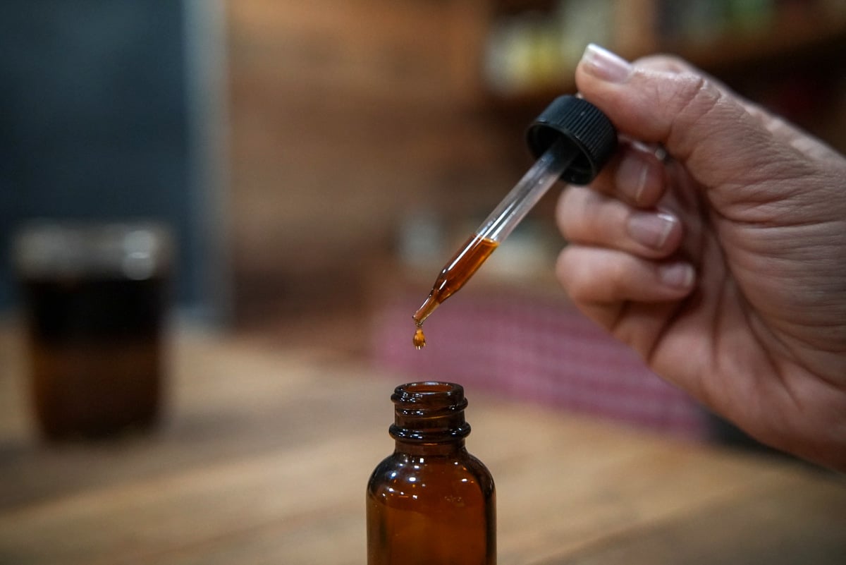 A dropper bottle with herbal bitters.