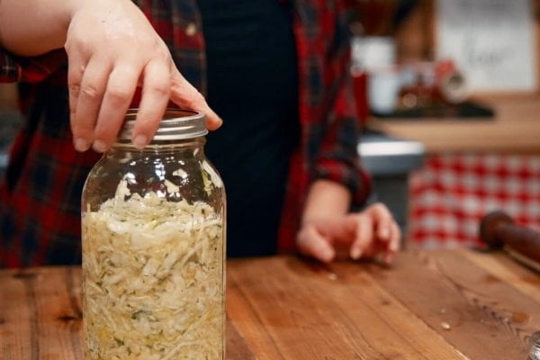 A jar of garlic dill sauerkraut.