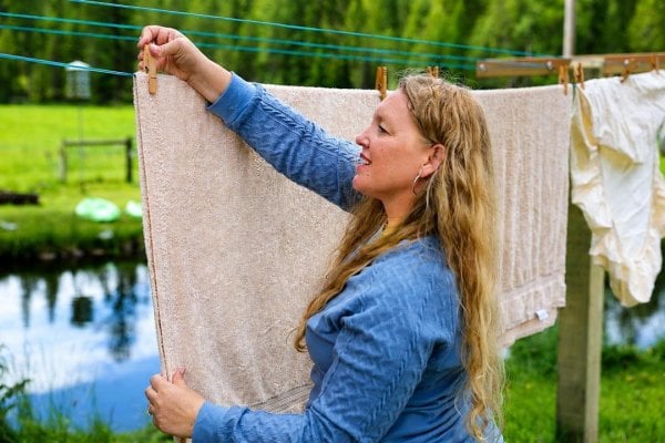Carolyn hanging Laundry.