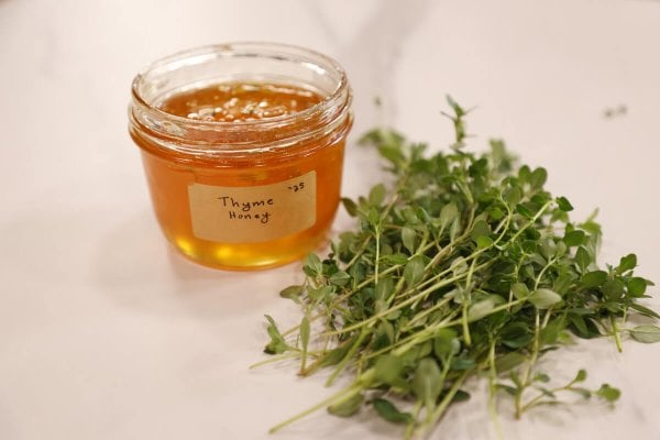 Herbal honey and fresh herbs.